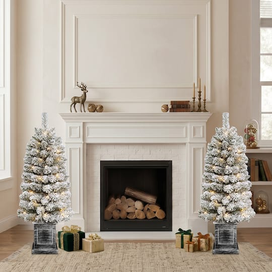 Puleo International 3.5ft. Pre-Lit Battery-Operated Flocked Spruce Artificial Christmas Trees with Pinecones, Warm White LED Lights, 2ct.